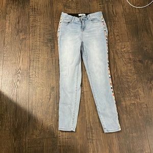 light wash skinny jeans with stitching on the sides